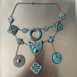 BRONZE METAL NECKLACE COATED WITH TURQUOISE COLOR DANGLING PIECES
